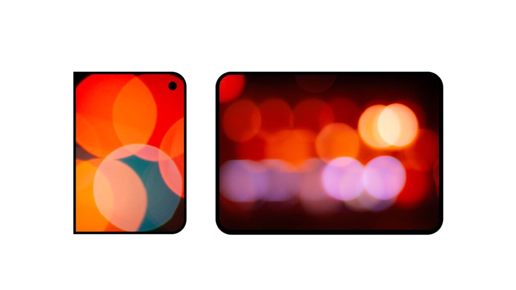 Red toned wallpaper for iPhone Duo made of blurred lights